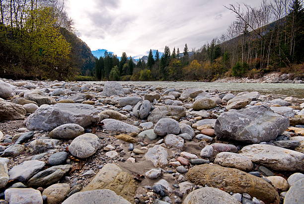 istock Rocks in the flowing river at the mountains 475471428