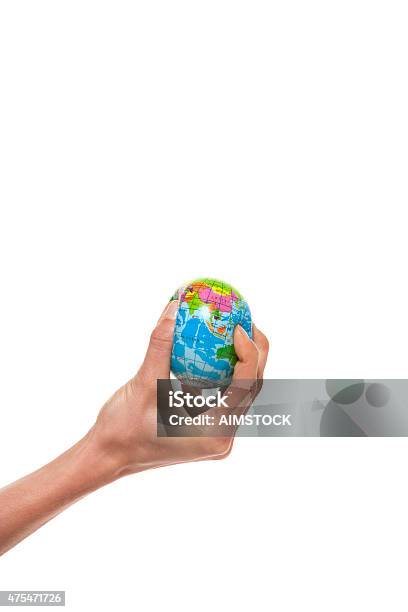 Hand Squeezing A Globe Stock Photo - Download Image Now - 2015, Adult, Adults Only