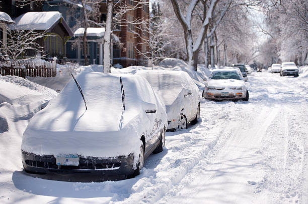 istock Snow covered Cars 475472767