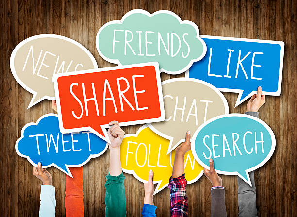istock Diverse Hands Holding Colorful Speech Bubbles with Words 475472812