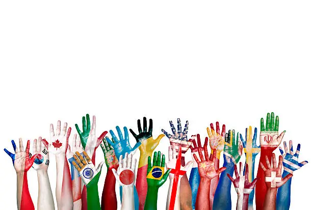 Photo of Group of Diverse Flag Painted Hands Raised