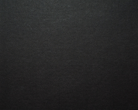 Black cardboard paper background and texture