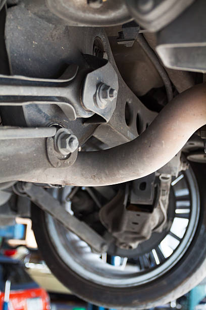 istock Lifted up car and exhaust pipe 475481255