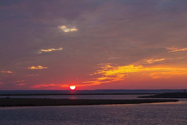 istock Assawoman Bay at Sun Down with Clouds 475492984