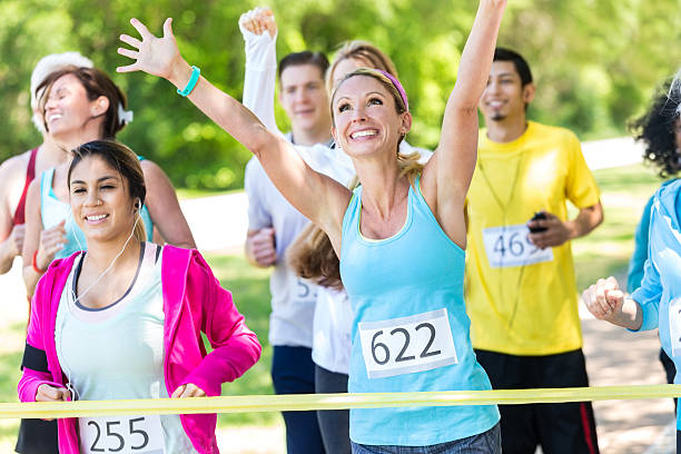 istock Happy runner winning marathon or charity race 475493628