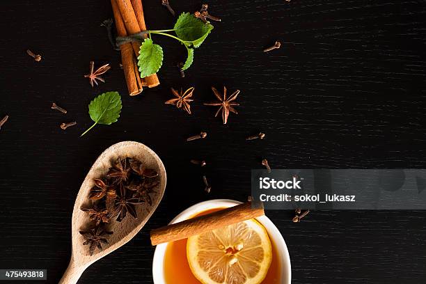 Anise Stars Tea And Cinnamon Sticks On Wood Stock Photo - Download Image Now - 2015, Alcohol - Drink, Anise