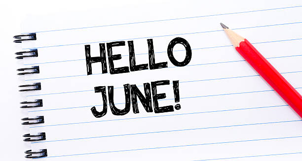 Hello June Hello June Text written on notebook page, red pencil on the right. Concept image june file stock pictures, royalty-free photos & images