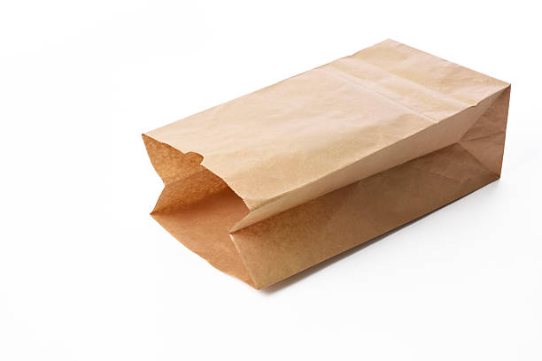 Opened blank brown paper bag on white background