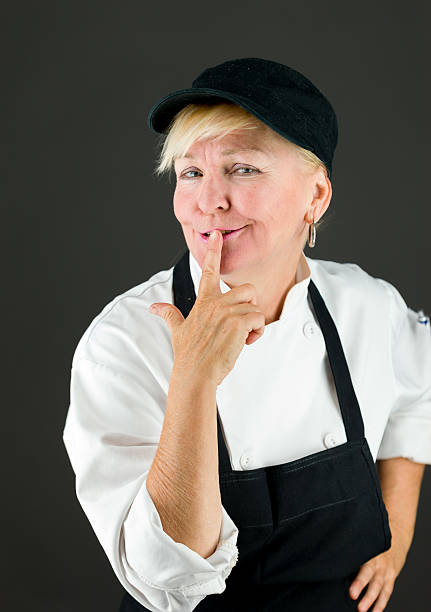 istock model isolated with finger on lips secret 475498336