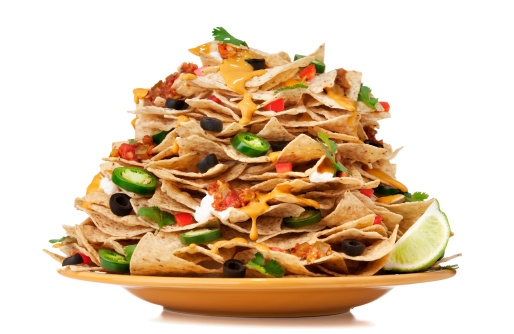 Large stack of nachos.  Please see my portfolio for other food and drink images.