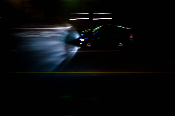istock Black car in the night 475501076