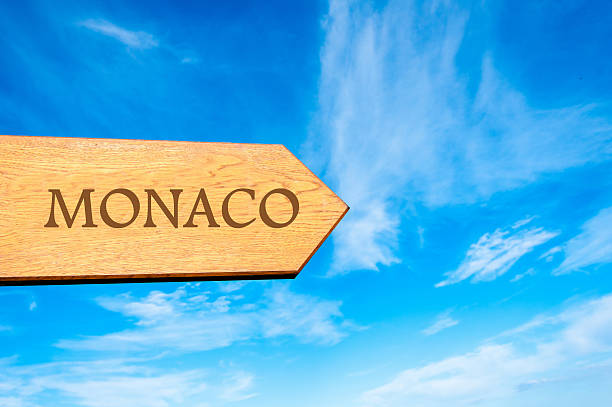 istock Wooden arrow sign pointing destination MONACO 475501222