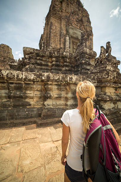 istock Tourist woman visiting ancient temples 475504594