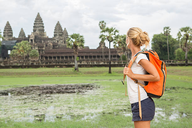 istock Young tourist at Angkor Wat temple 475507656