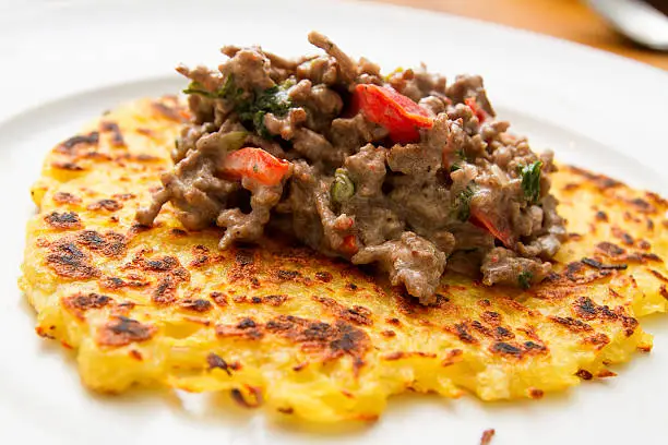 Potato pancakes with minced meat sauce