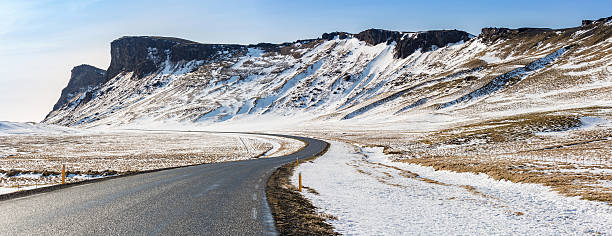 istock Road Winter Mountain Iceland 475511636