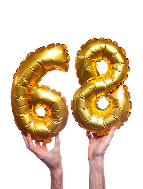istock Gold number 68 balloons 475511842