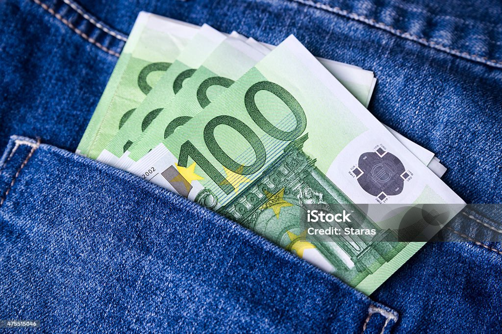 Money in the jeans pocket Money in the jeans pocket. Euro banknotes Currency Stock Photo