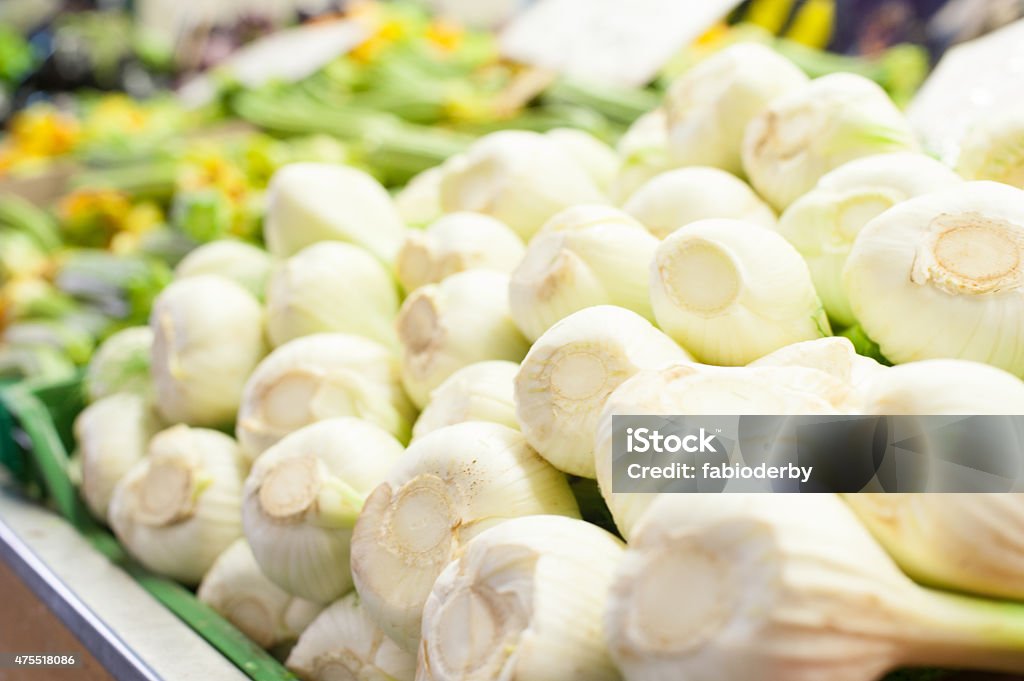 white raw and fresh fennel bulbs heap white raw and fresh fennel bulbs heap in market selective focus 2015 Stock Photo