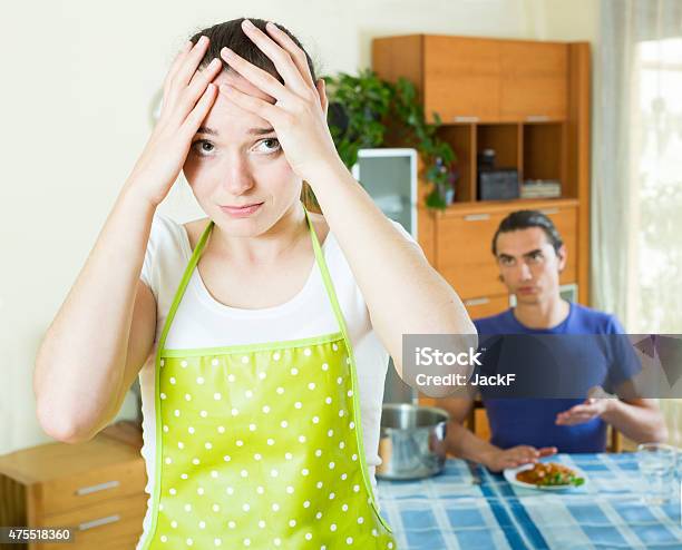 Girl Serving Food Her Man At Table Stock Photo - Download Image Now - 2015, Adult, Boredom