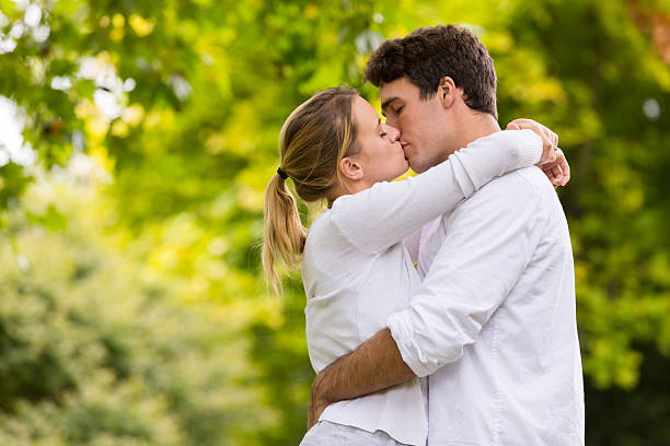 istock loving young couple kissing 475519178