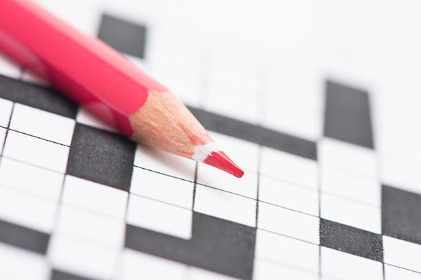 istock Crossword puzzle and pen 475520124