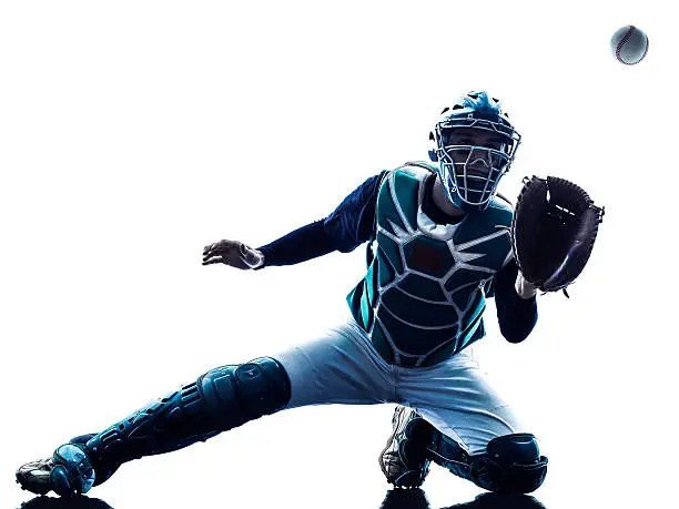 one caucasian man baseball player playing  in studio  silhouette isolated on white background