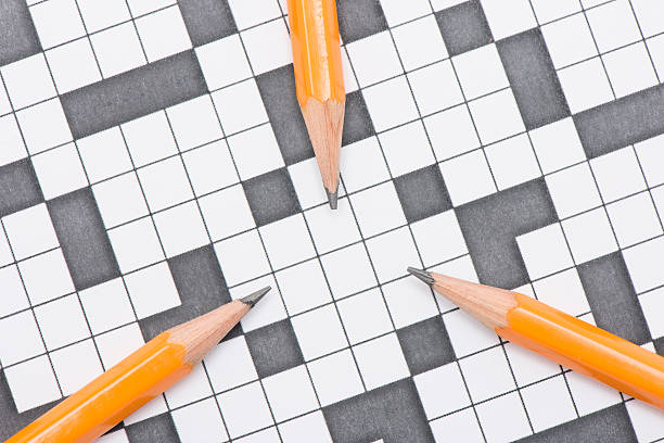 istock Crossword puzzle and pen 475522454