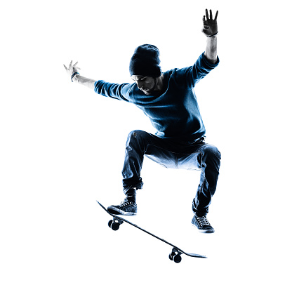 one caucasian man skateboarder skateboarding  in silhouette isolated on white background