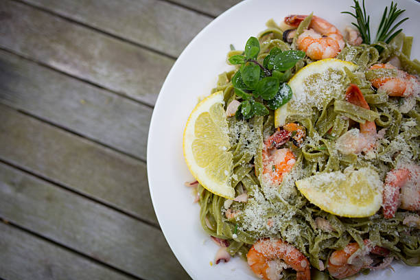 pescados y mariscos, pasta - gran padano fotografías e imágenes de stock