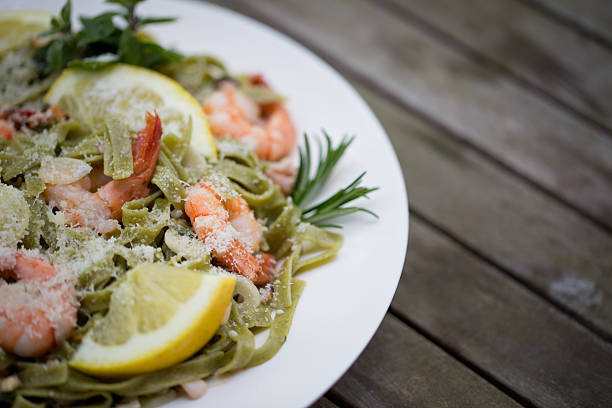 pescados y mariscos, pasta - gran padano fotografías e imágenes de stock