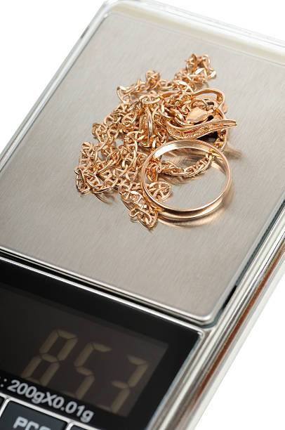 Jewelry scrap electronic scales Jewelry made of gold on precision electronic scales. Pawn pawnshop milligrams stock pictures, royalty-free photos & images