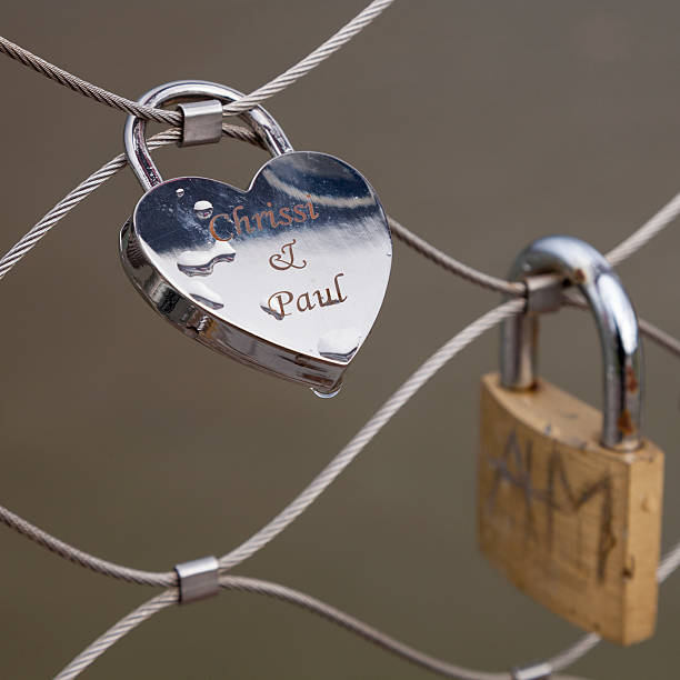 istock Love locks on wire fence 475530638
