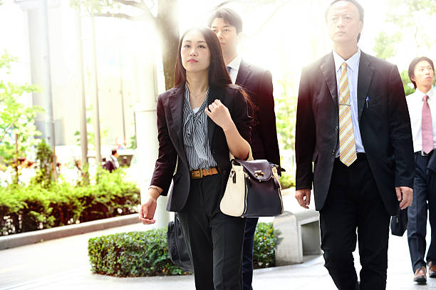 istock Pedestrian crowd walking in central Tokyo 475536616