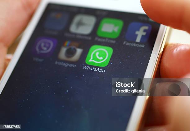 Launching Whatsapp On Iphone 5s Stock Photo - Download Image Now.