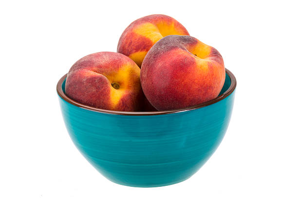istock Peaches in the bowl 475539315