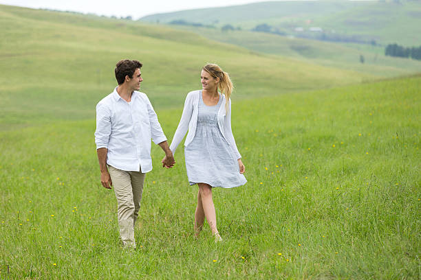 istock couple walking on countryside 475542890