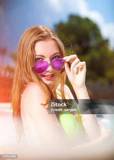 Beautiful Teenage Girl At The Swimming Pool Stock Photo - Download Image Now - 2015, Adulation, Adult