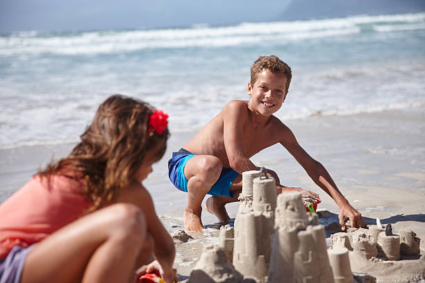 istock Building awesome sandcastles with sis 475544134