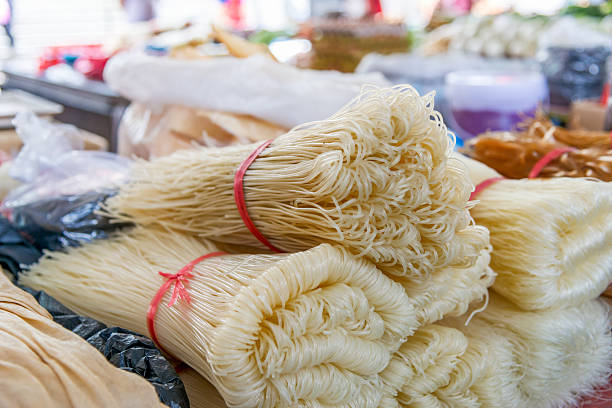 closeup of dry noodles drying in the sun