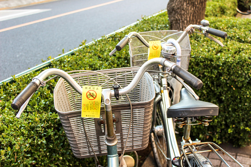 Tokyo, Japan - February 22, 2013: Tokyo has not enough space, therefore even bicycles get a parking ticket.