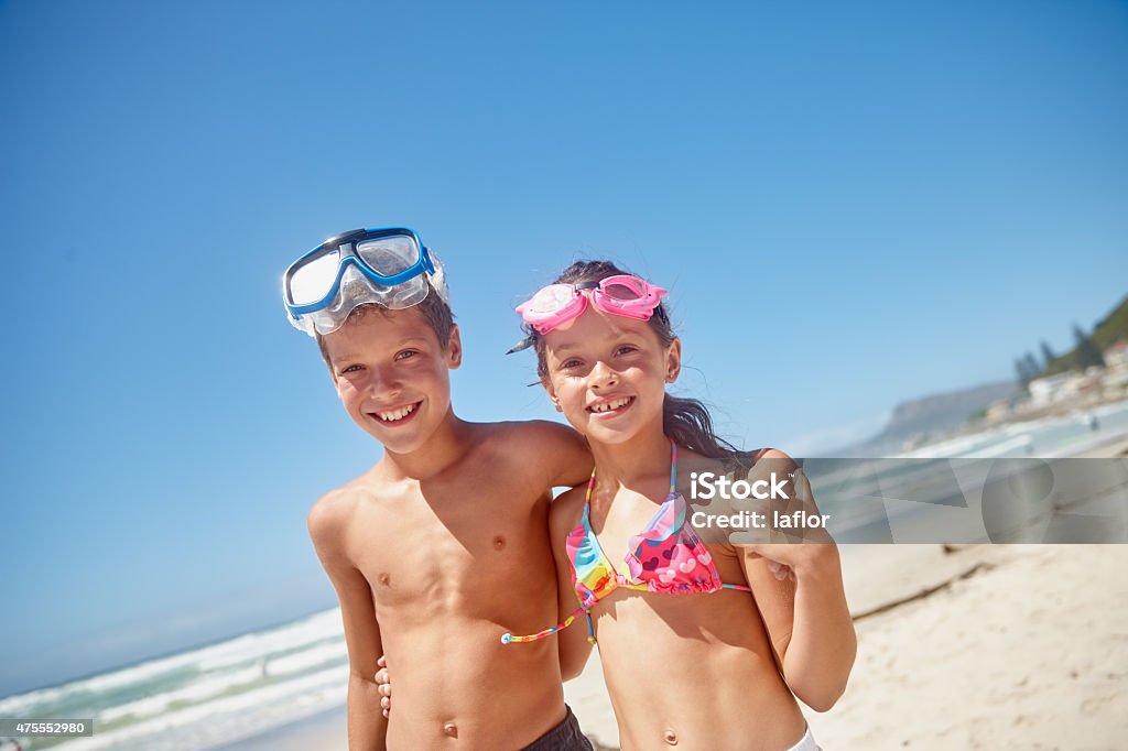 Enjoying a day at the beach with his sister Portrait of a brother and sister standing together on the beachhttp://195.154.178.81/DATA/i_collage/pu/shoots/804728.jpg 2015 Stock Photo