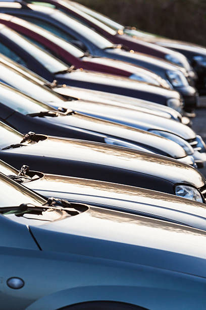 istock row of cars in backlit 475554245