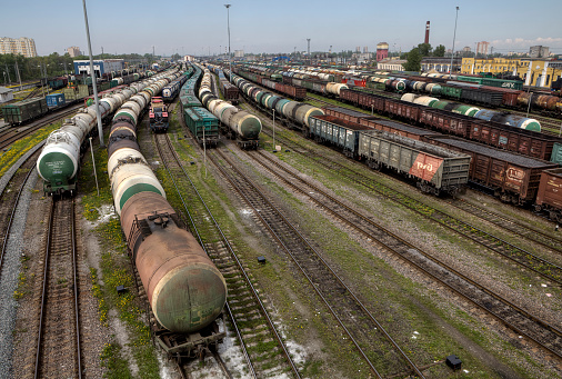 St. Petersburg, Russia - May 22, 2015: Classification yard, Freight Station with trains, freight train leaves railroad shunting yard, Parked freight trains.