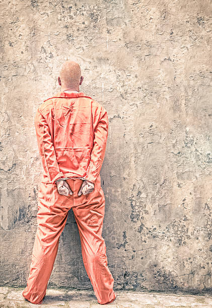 istock Handcuffed prisoner in Jail waiting for Death Penalty 475556099