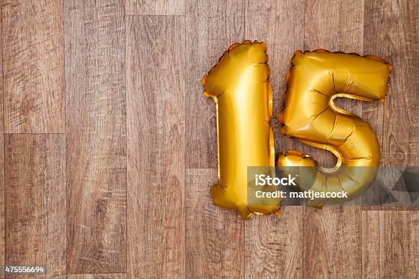 Gold Number 15 Balloon Stock Photo - Download Image Now - Anniversary, Number 15, Balloon