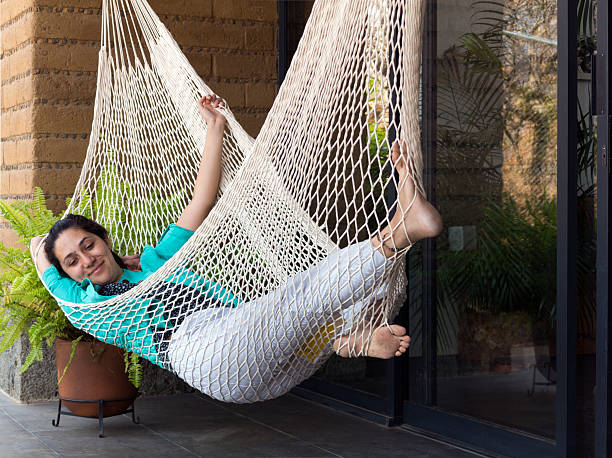istock Woman relaxing in Hammock 475556750