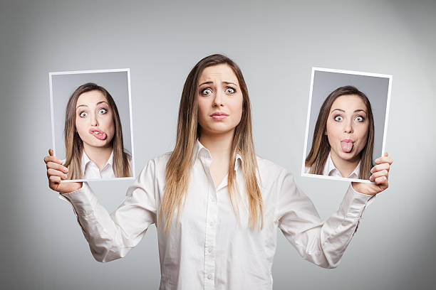 istock Young woman hiding her emotions 475557431