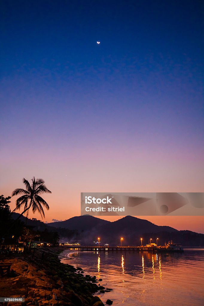 Sunset on Chaloklum beach Beautiful sunset on tropical island Koh Phangan in Thailand. Chalokum beach landscape. 2015 Stock Photo