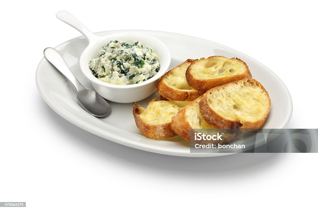 artichoke spinach dip, healthy vegetarian food artichoke spinach dip, healthy vegetarian food isolated on white background Dipping Sauce Stock Photo